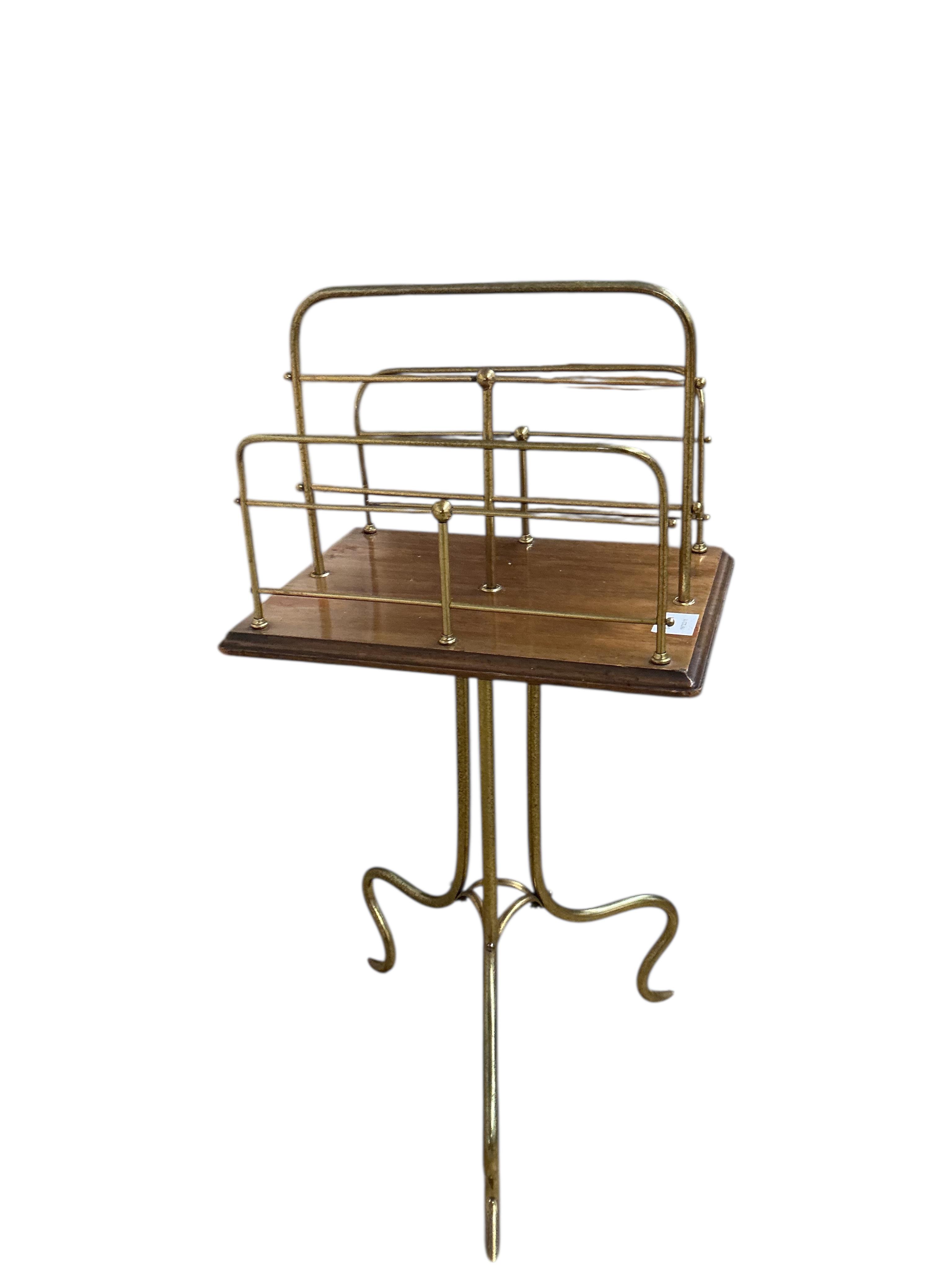 An Edwardian mahogany and tubular brass two division revolving magazine stand, width 40cm, depth 28cm, height 82cm